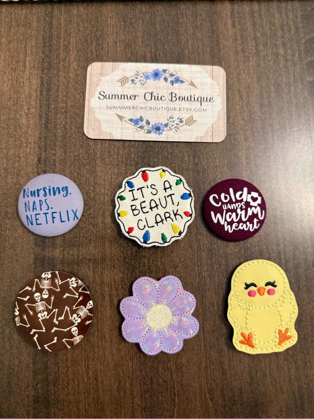 Interchangeable nurse badge reel tops